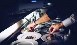 European chefs plating dishes – hire hospitality staff in Europe